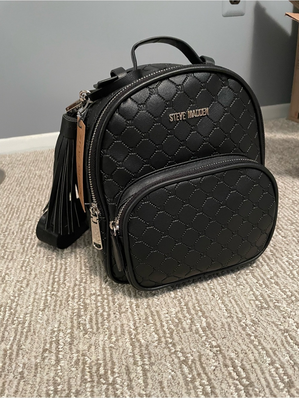 NWT Steve Madden Black Quilted Backpack Purse with Tassel
